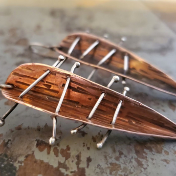 Tribal folds w/ long pins